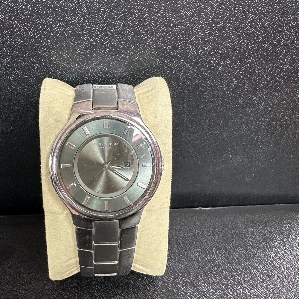 Kenneth Cole Silver Watch with Minimalist Design